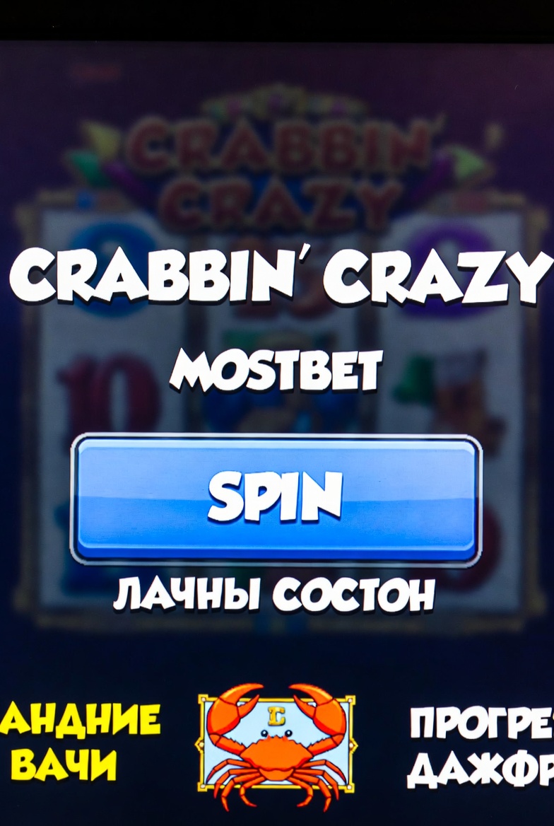 Launch button for the Crabbin' Crazy slot at Mostbet casino with a call to action